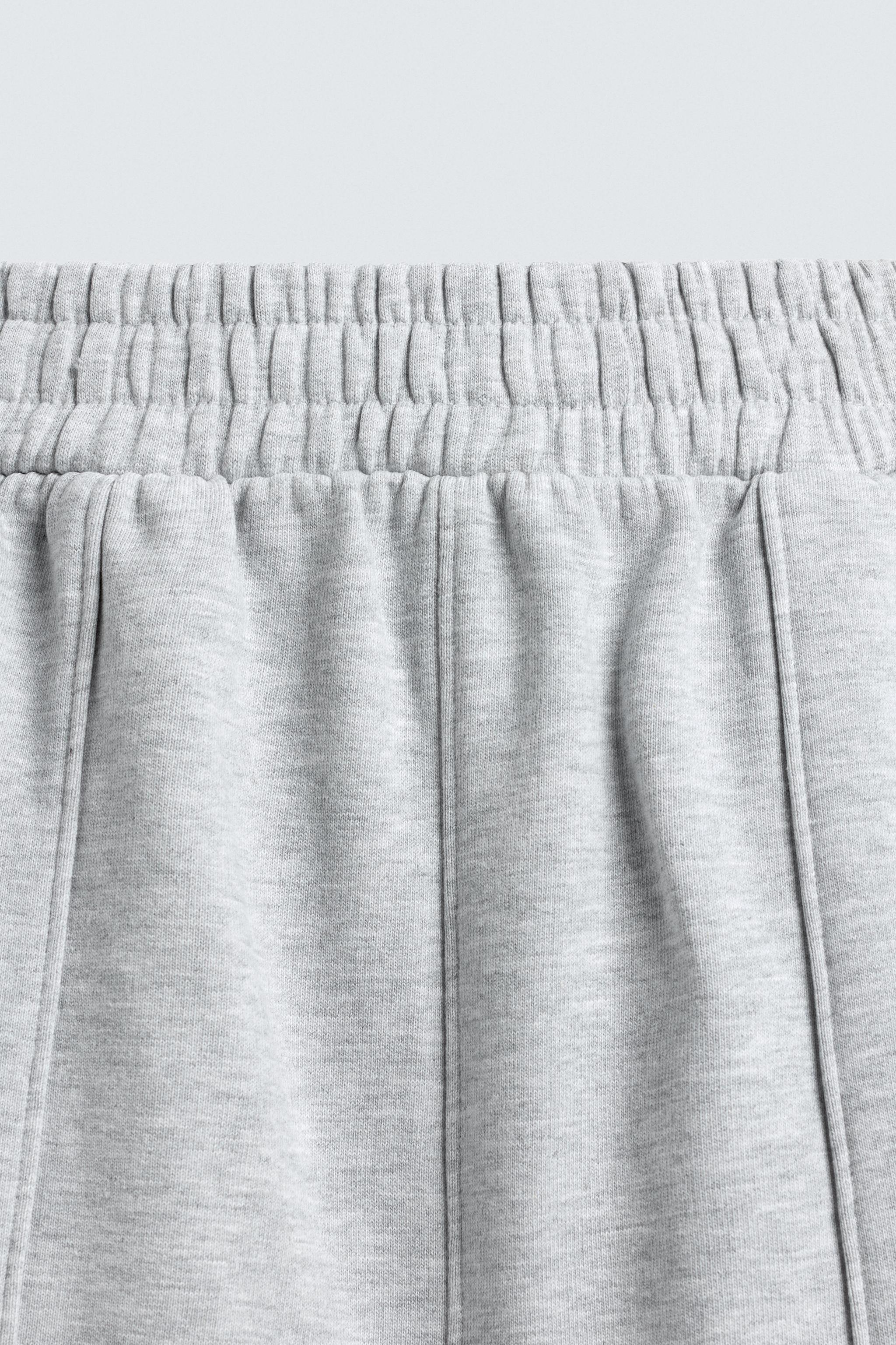 PANTALON DE JOGGING COUPE BALLON AVEC PIÈCE