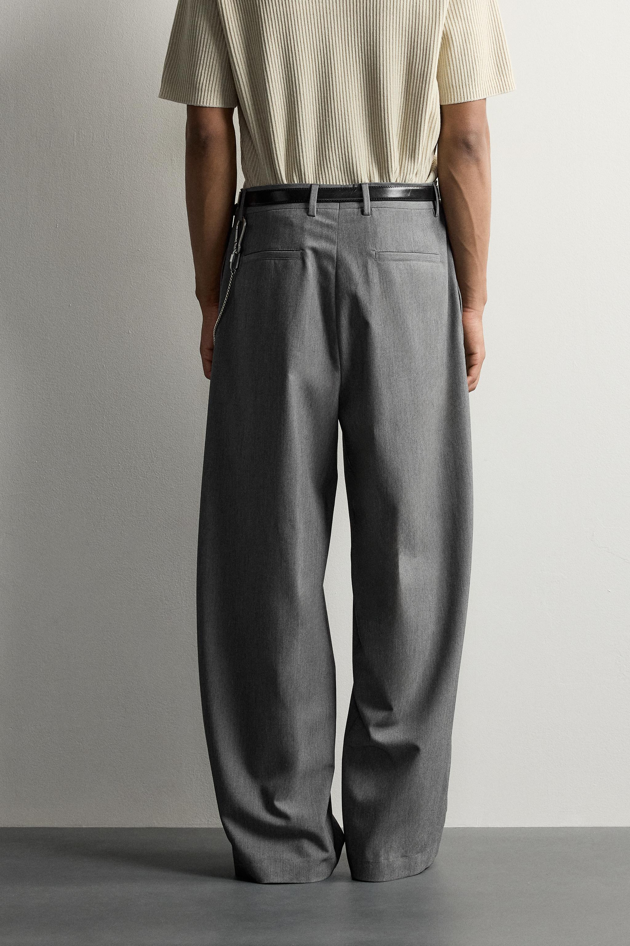 PANTALON COUPE LARGE À PLIS