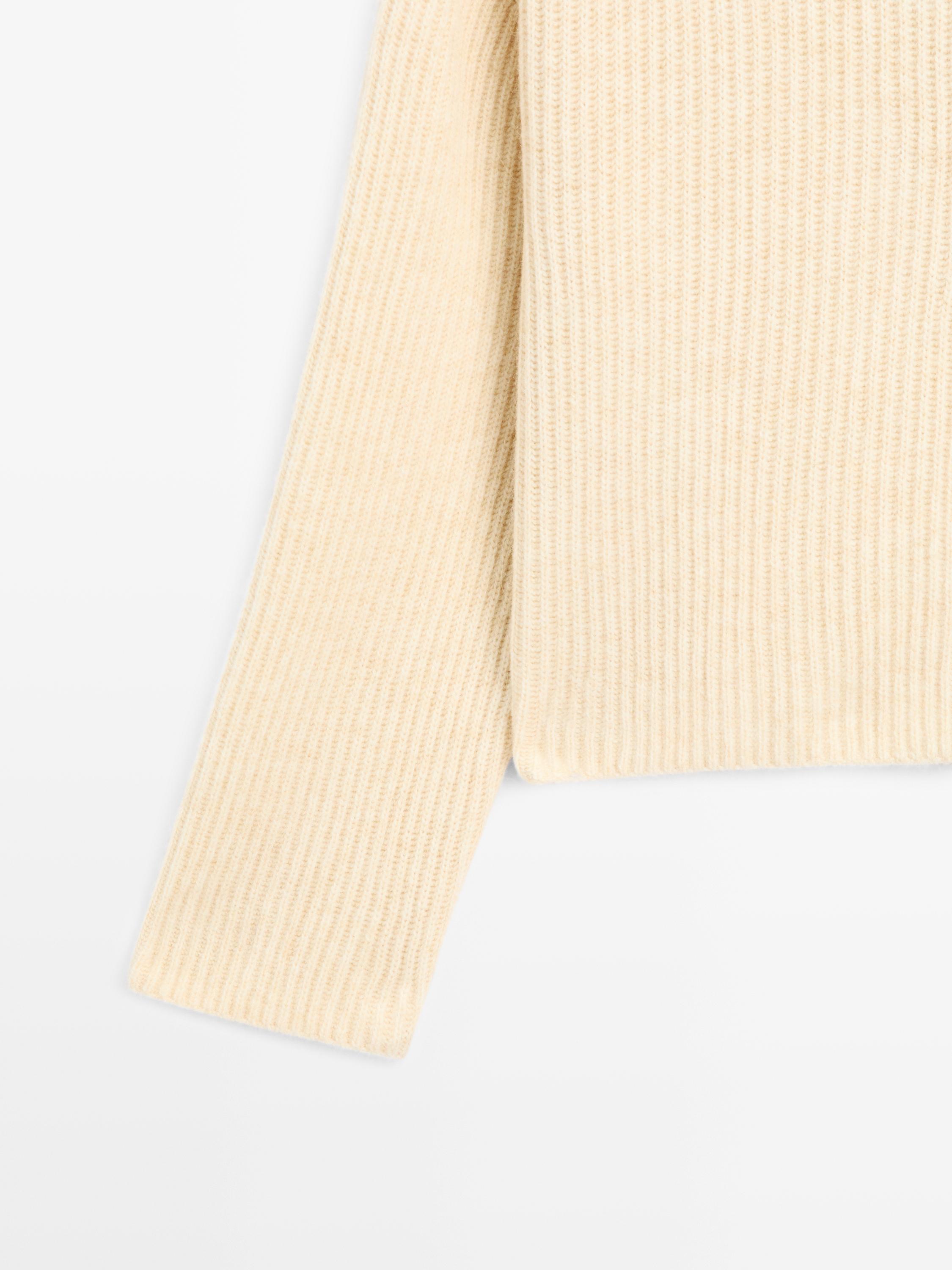 Wool blend sweater with hood detail