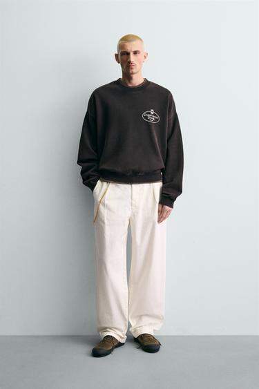 WASHED PRINTED SLOGAN SWEATSHIRT - Black by Zara - Image 0