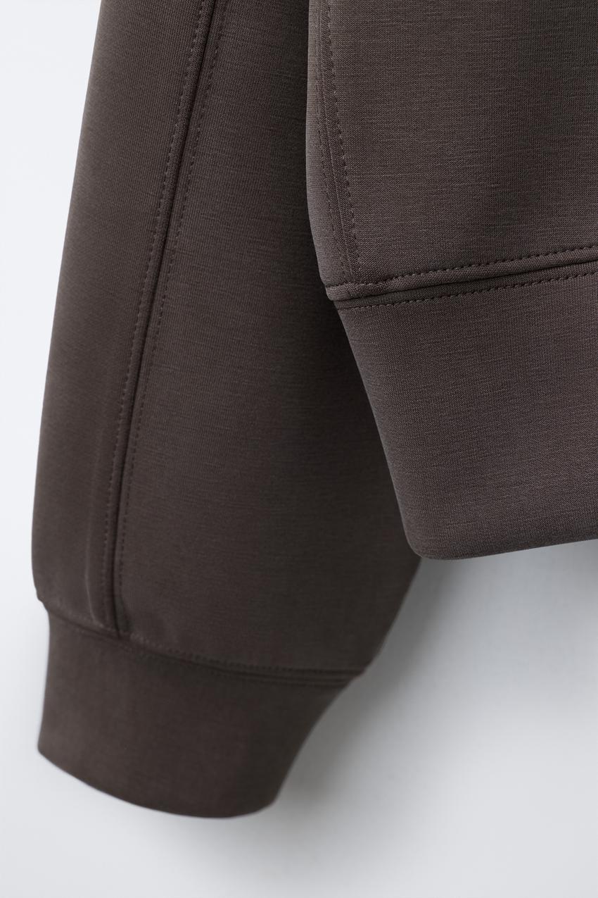 SPORTY SWEATSHIRT WITH RAISED SLOGAN