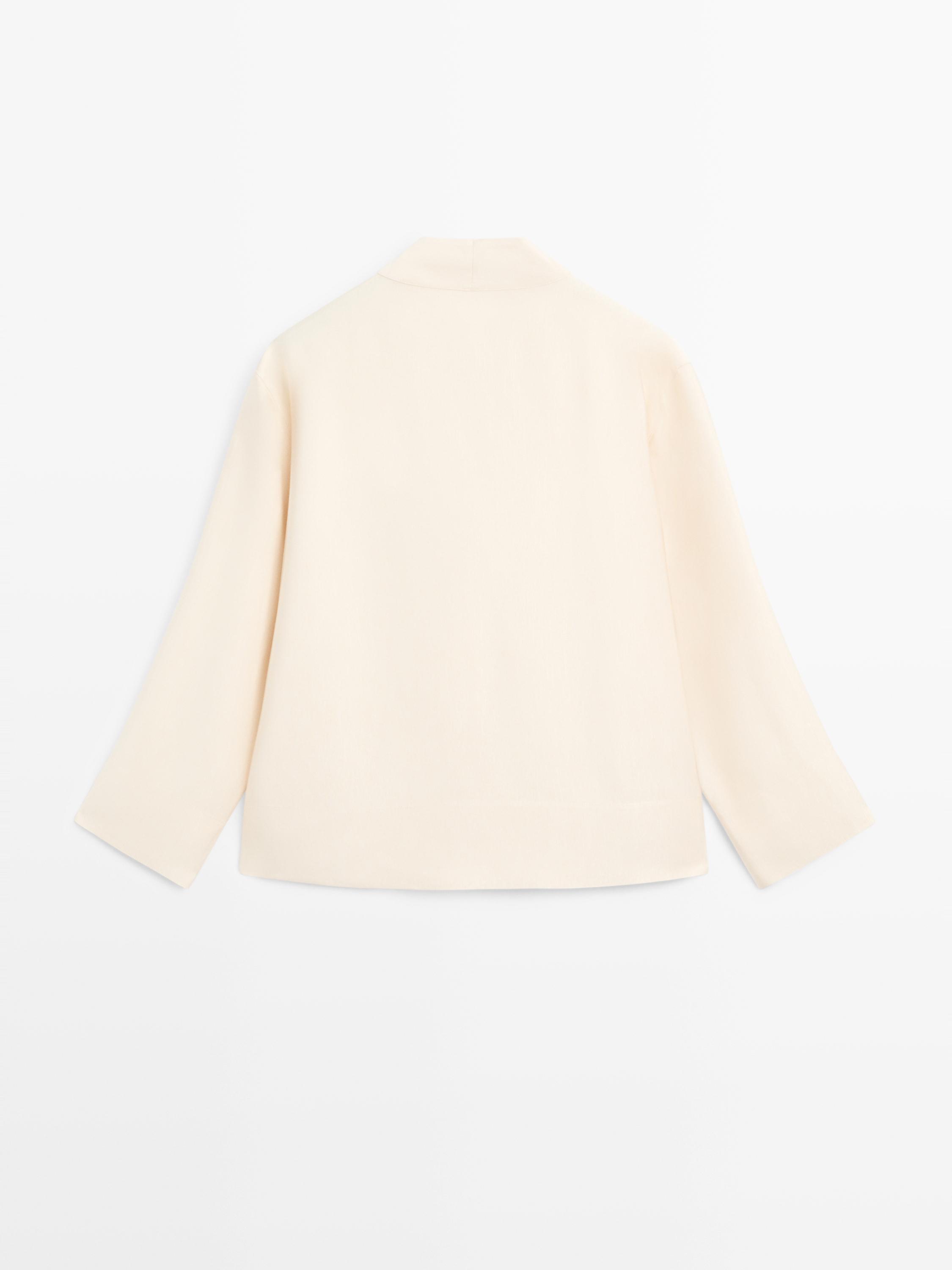 Flowing blouse with bib detail