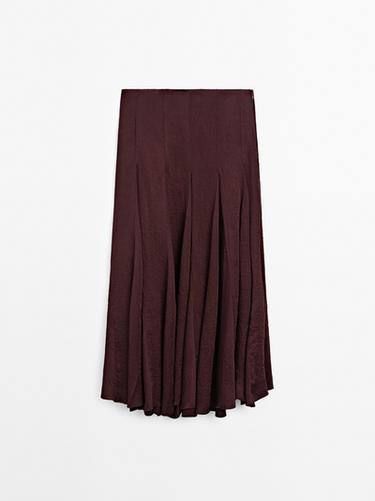 Falda midi fluida detalle godets - STUDIO - varios de Zara