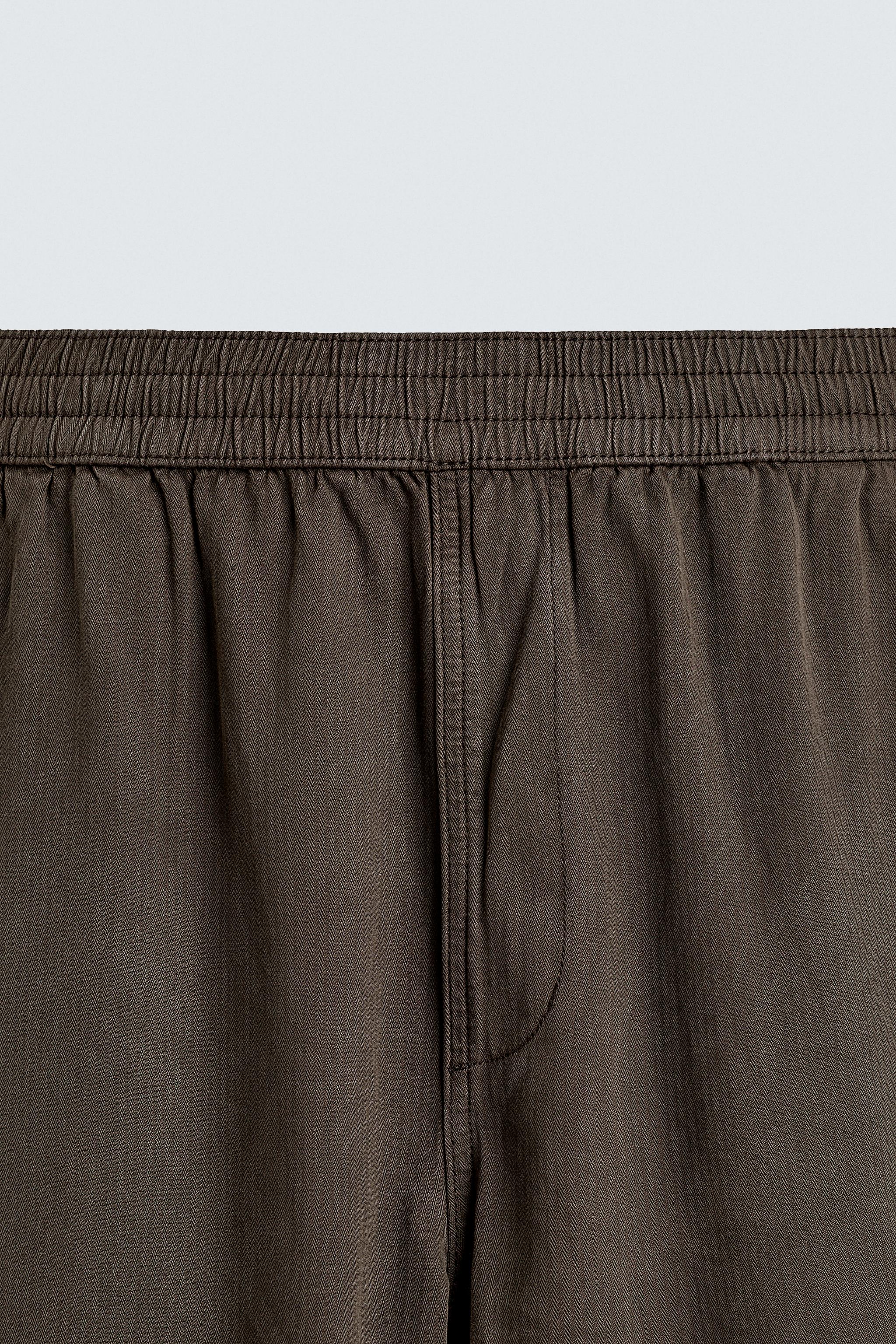 RELAXED FIT HERRINGBONE PANTS