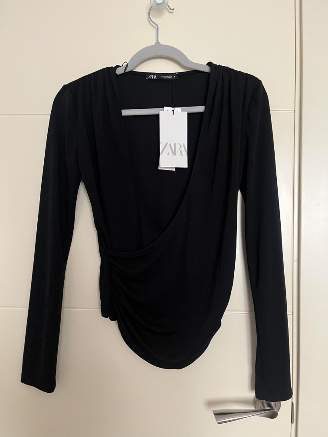 DRAPED CROSSOVER TOP