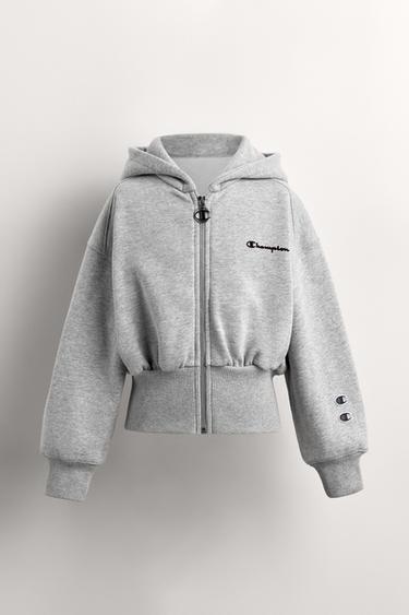 SWEAT ZIPPÉ INSCRIPTION FLOQUÉE CHAMPION ® X ZARA - Gris chiné de Zara
