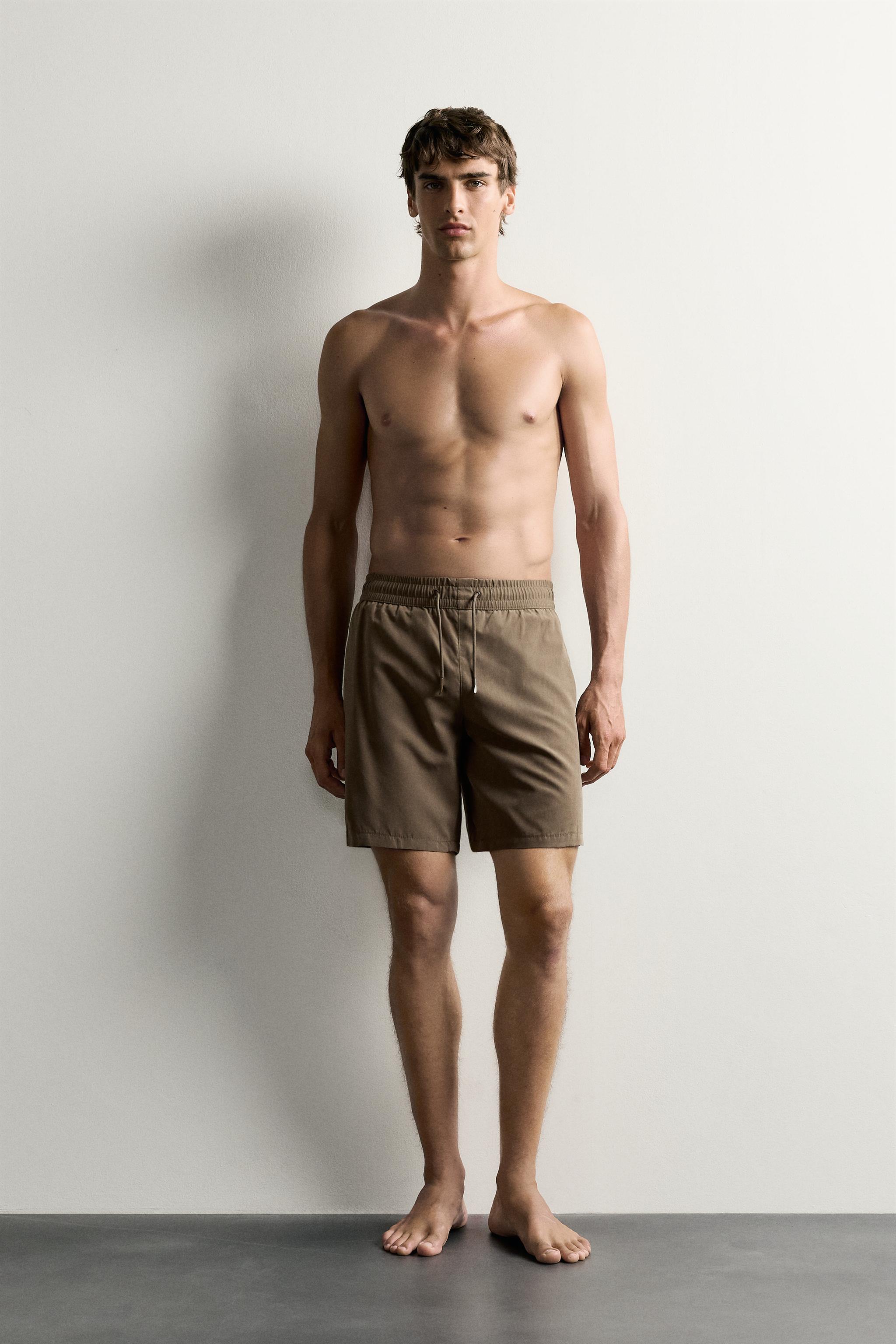 BASIC LONG SWIM TRUNKS