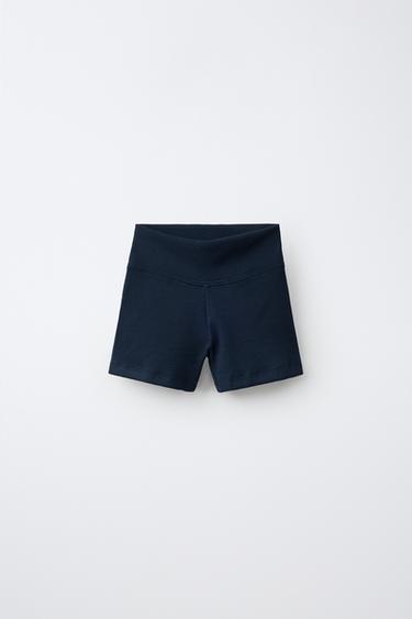 KRÁTKÉ ŽEBROVANÉ LEGÍNY - Modrá Navy od Zara