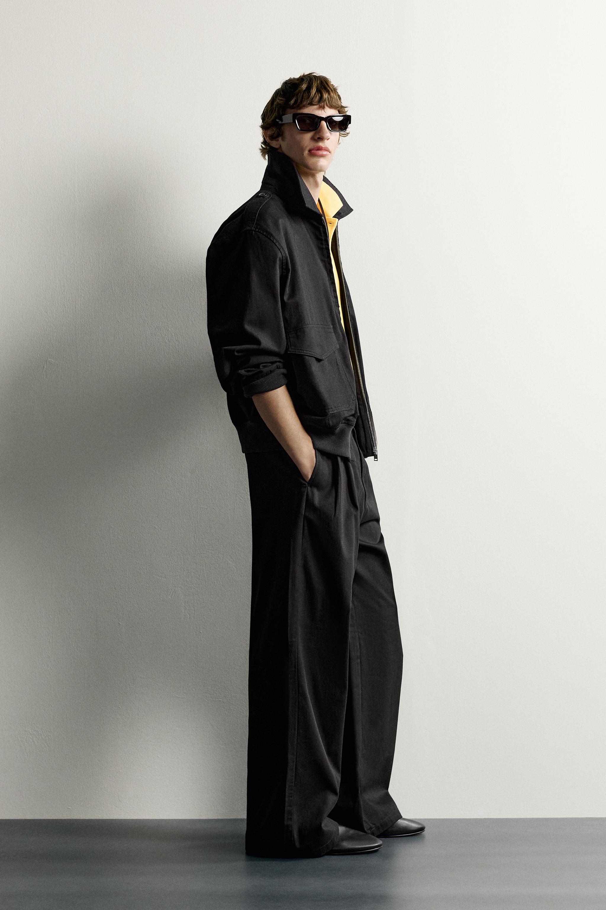 RELAXED-FIT PLEATED TROUSERS