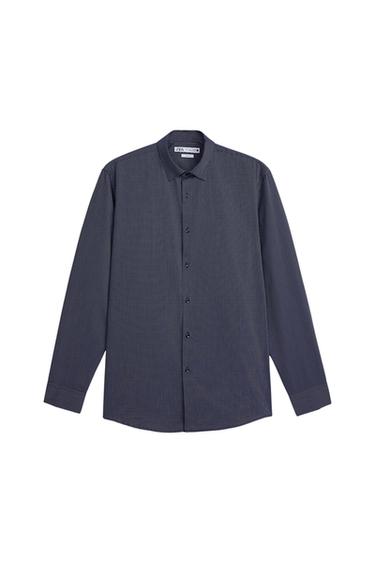 Front view of a navy blue button-up shirt with a micro-print pattern.