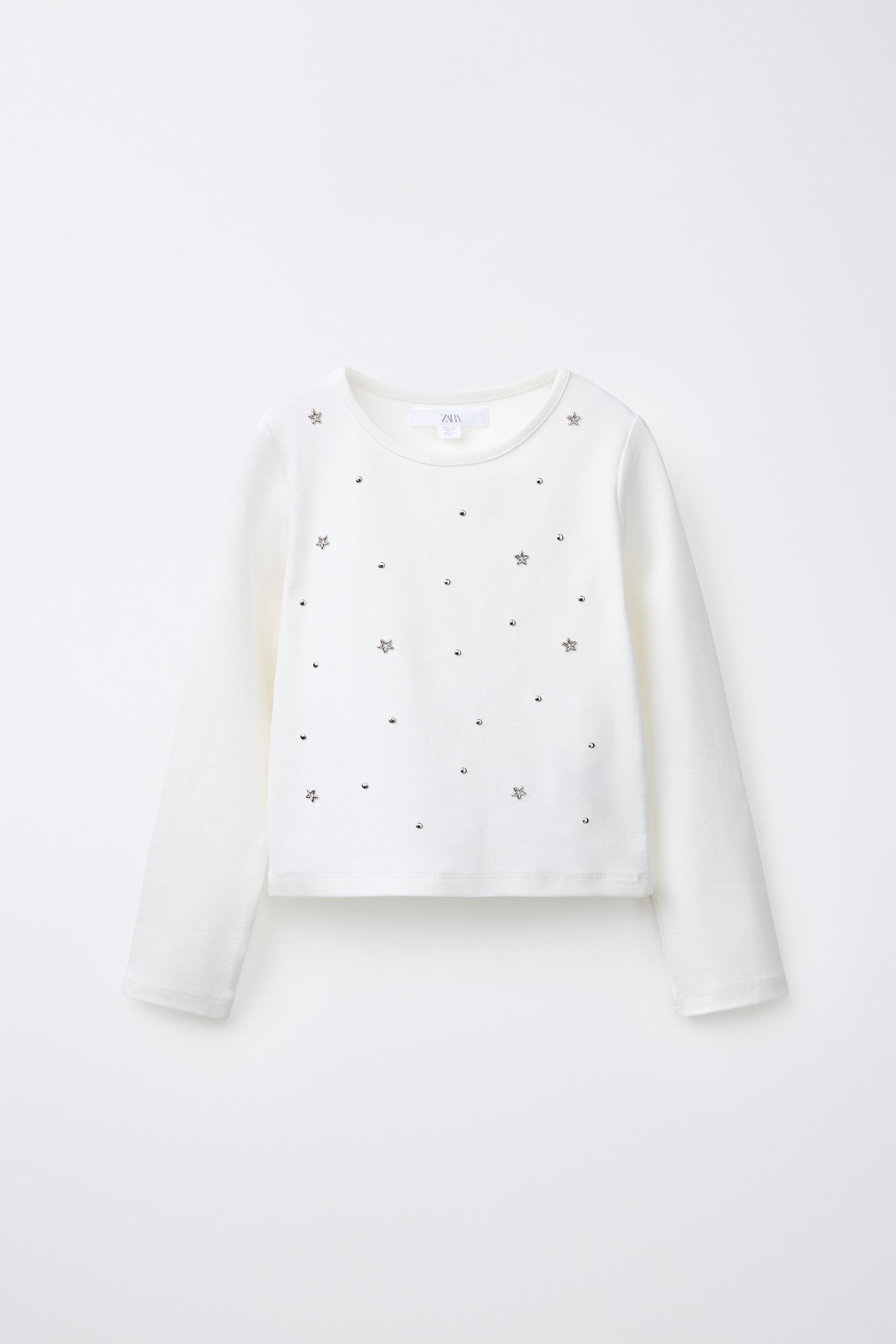 T-SHIRT CLOUTÉ