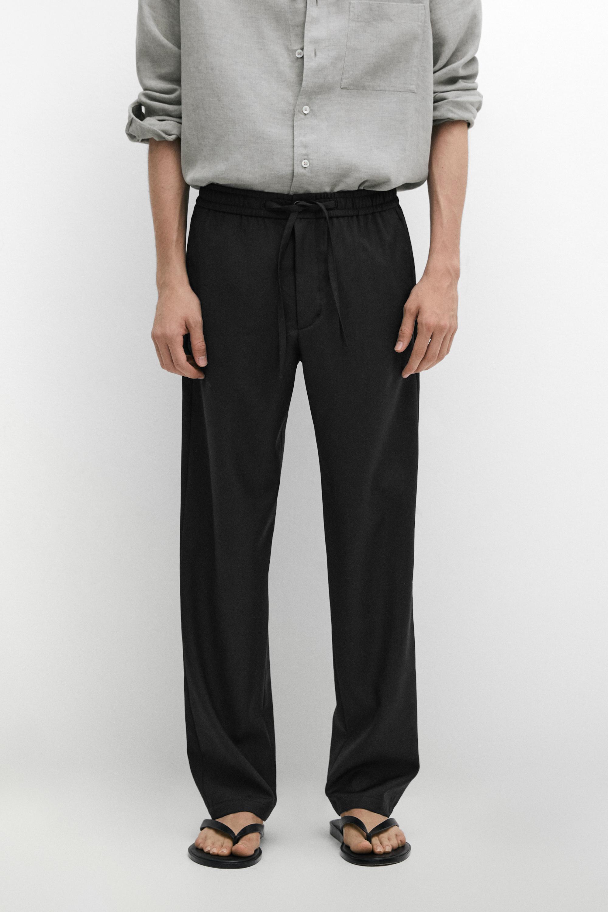 Relaxed fit 100% wool trousers — Black