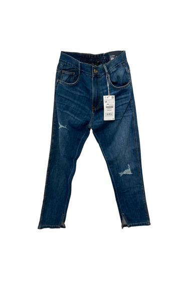 BLUE RIPPED SLOUCHY JEANS