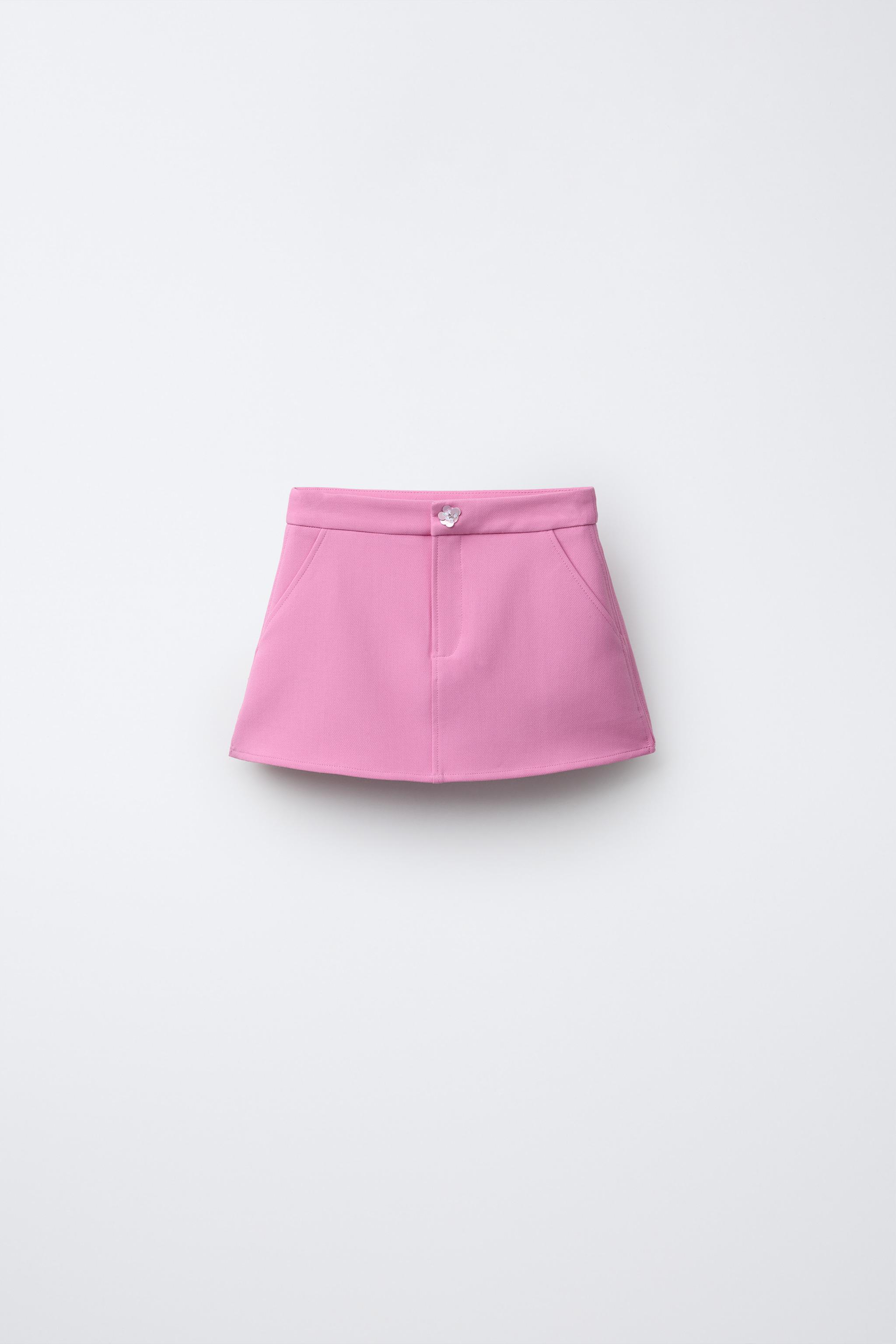 JUPE À BOUTON BIJOU