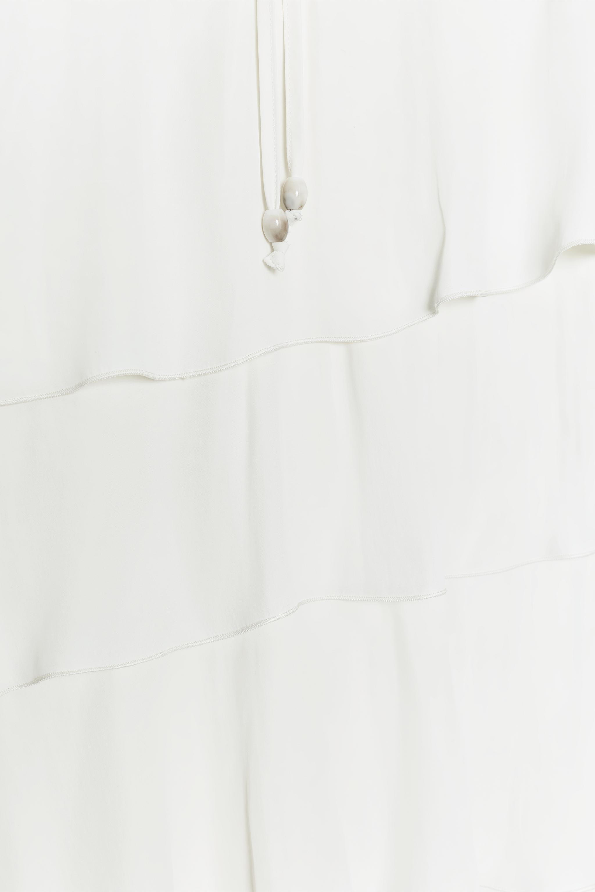 ROBE COURTE À VOLANTS
