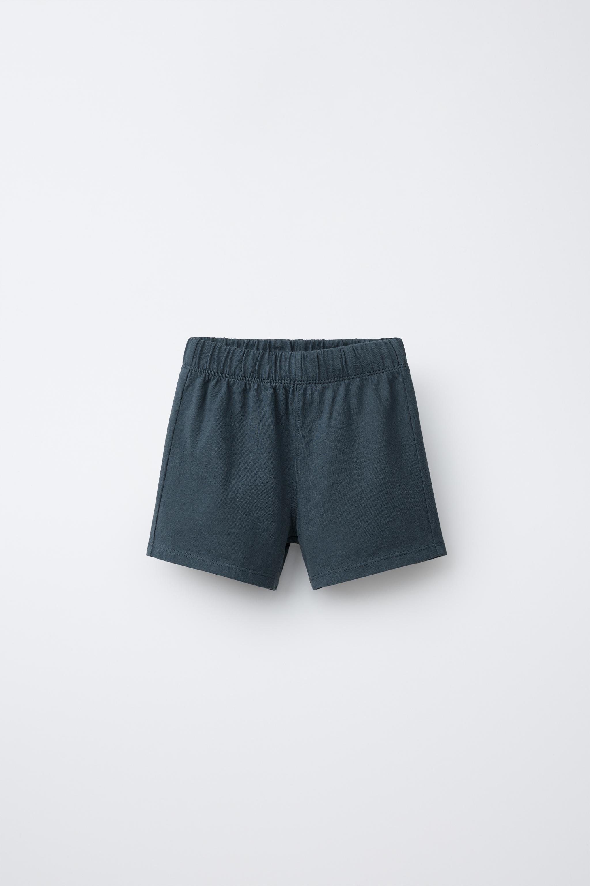 ENSEMBLE DE JOGGING POLO ET BERMUDA UNIS
