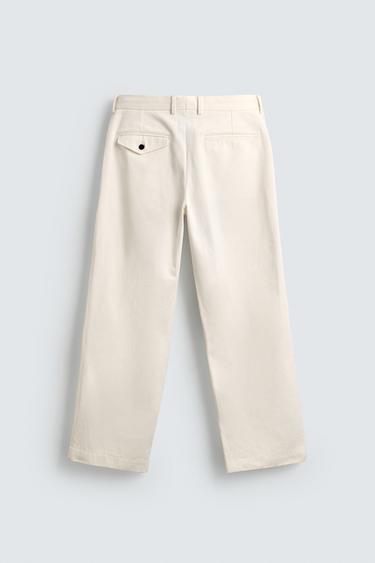 PANTALON CHINO À PLIS AARON LEVINE X ZARA - Blanc cassé de Zara - Image 6