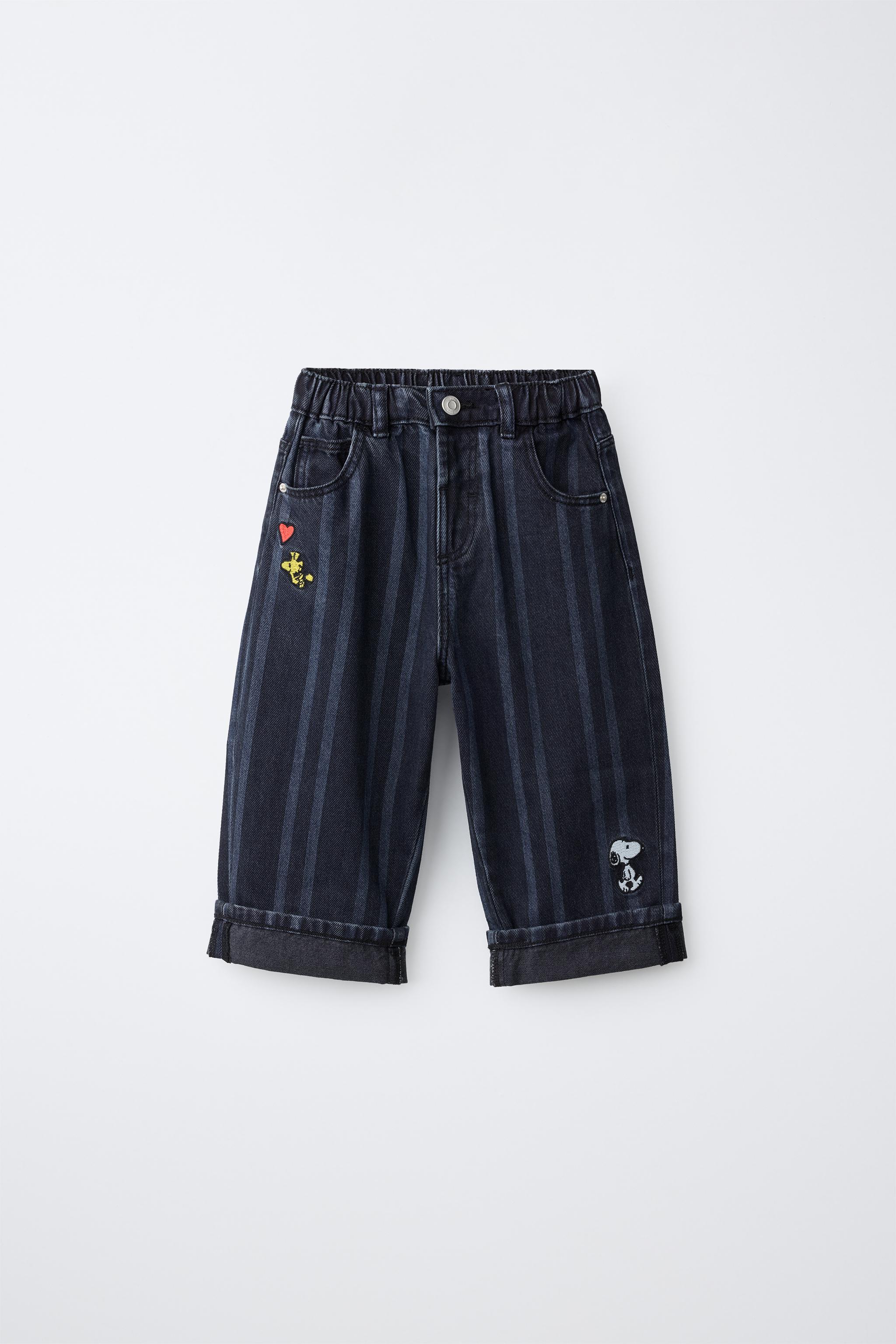JEANS BAGGY RAYAS BORDADOS SNOOPY PEANUTS™