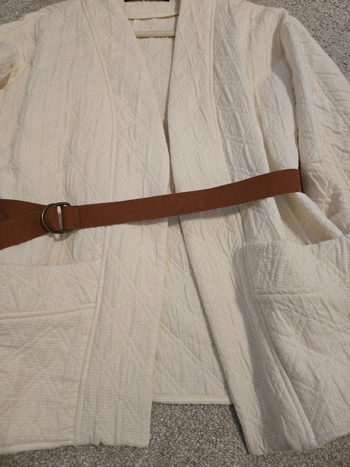 BELTED PUFFER JACKET