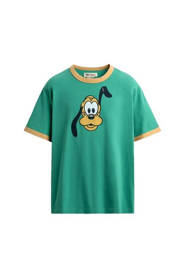 Green short-sleeved t-shirt with a collar and beige trims. Pluto print on the front. ZARA Disney interior label. White background.