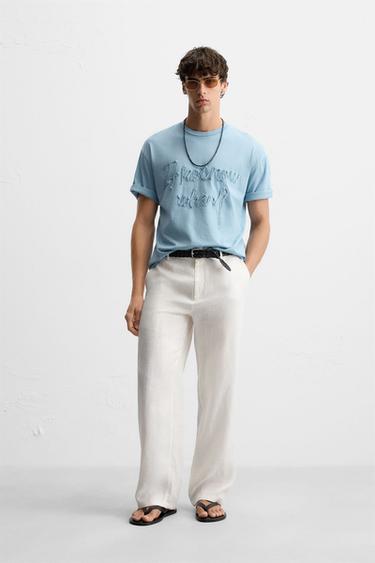 CAMISETA TEXTO RELIEVE - Azul de Zara - Imagen 0