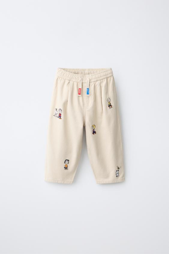 PANTALÓN BAGGY BORDADOS SNOOPY PEANUTS™ - Beige claro de Zara - Imagen 0