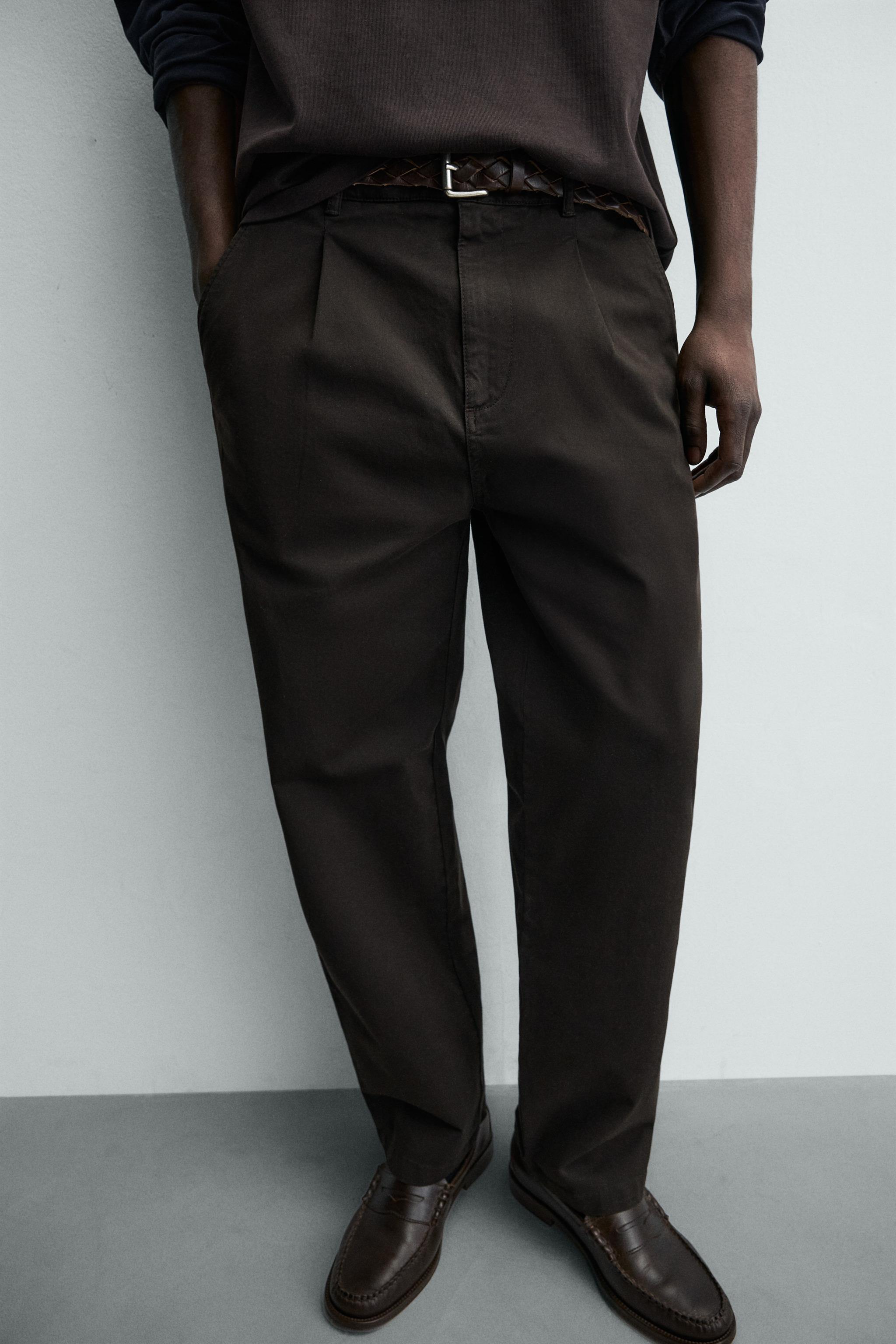 RELAXED FIT PLEATED PANTS