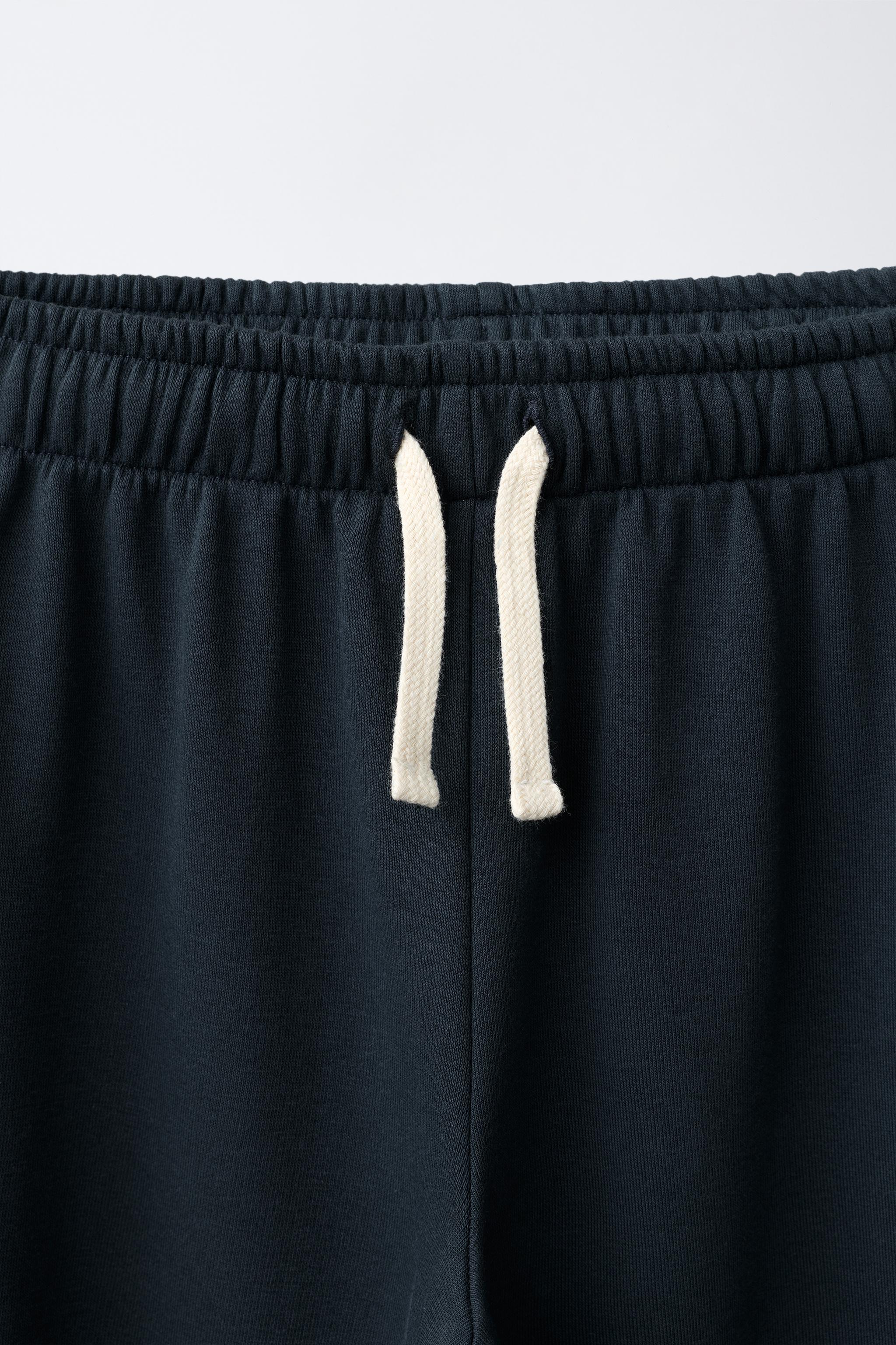 WIDE LEG STAR-PRINT SIDE-STRIPE PANTS