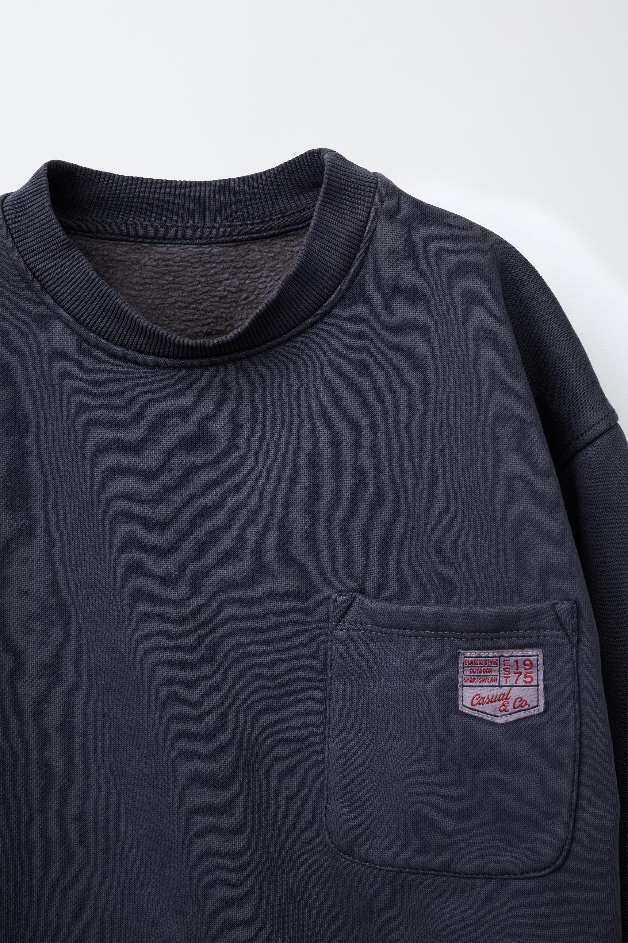 PLAIN SWEATSHIRT WITH LABEL POCKET