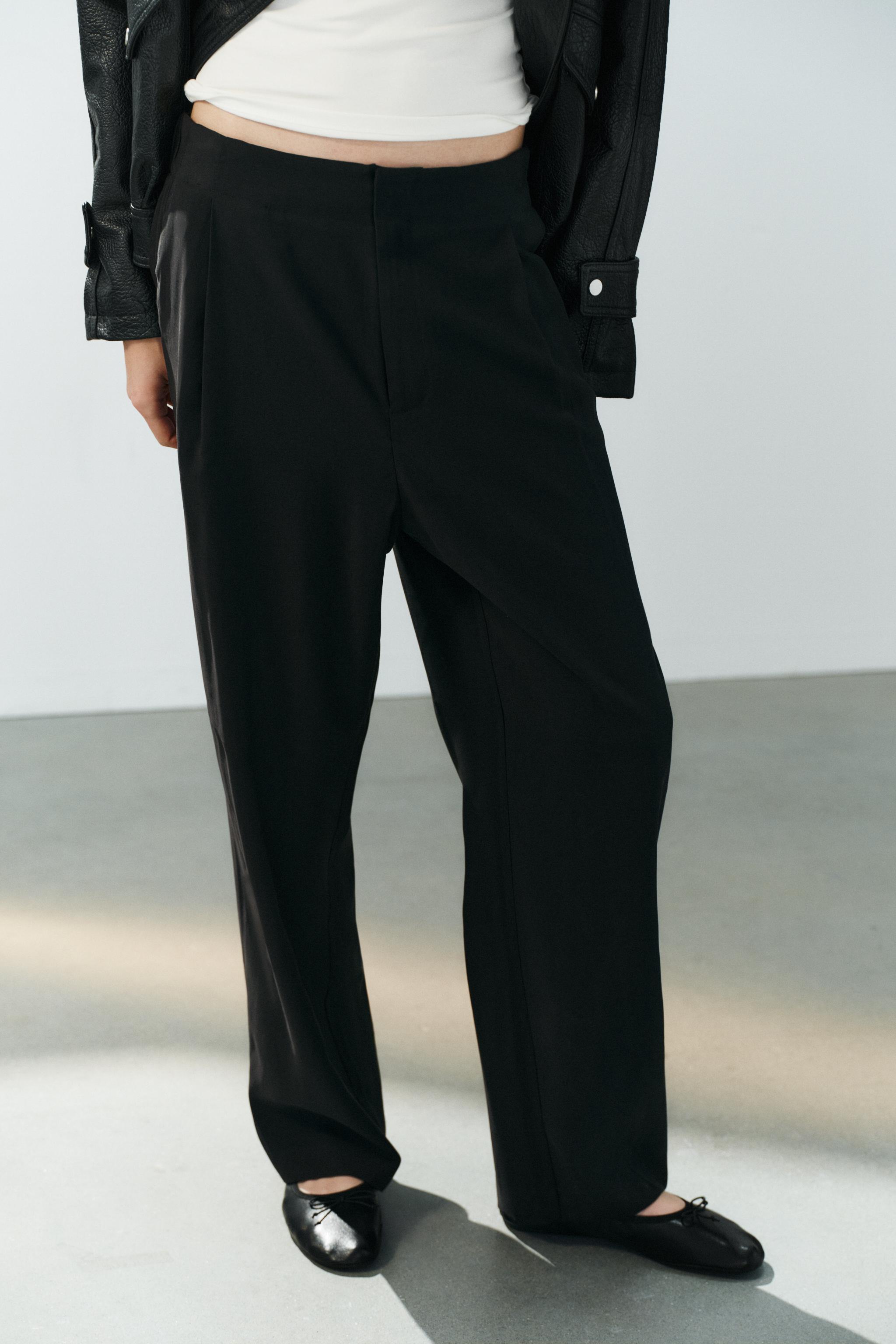 PLEATED FLOWY TROUSERS — Black
