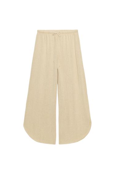 RUSTIC TROUSERS WITH VENTS - Light beige by Zara
