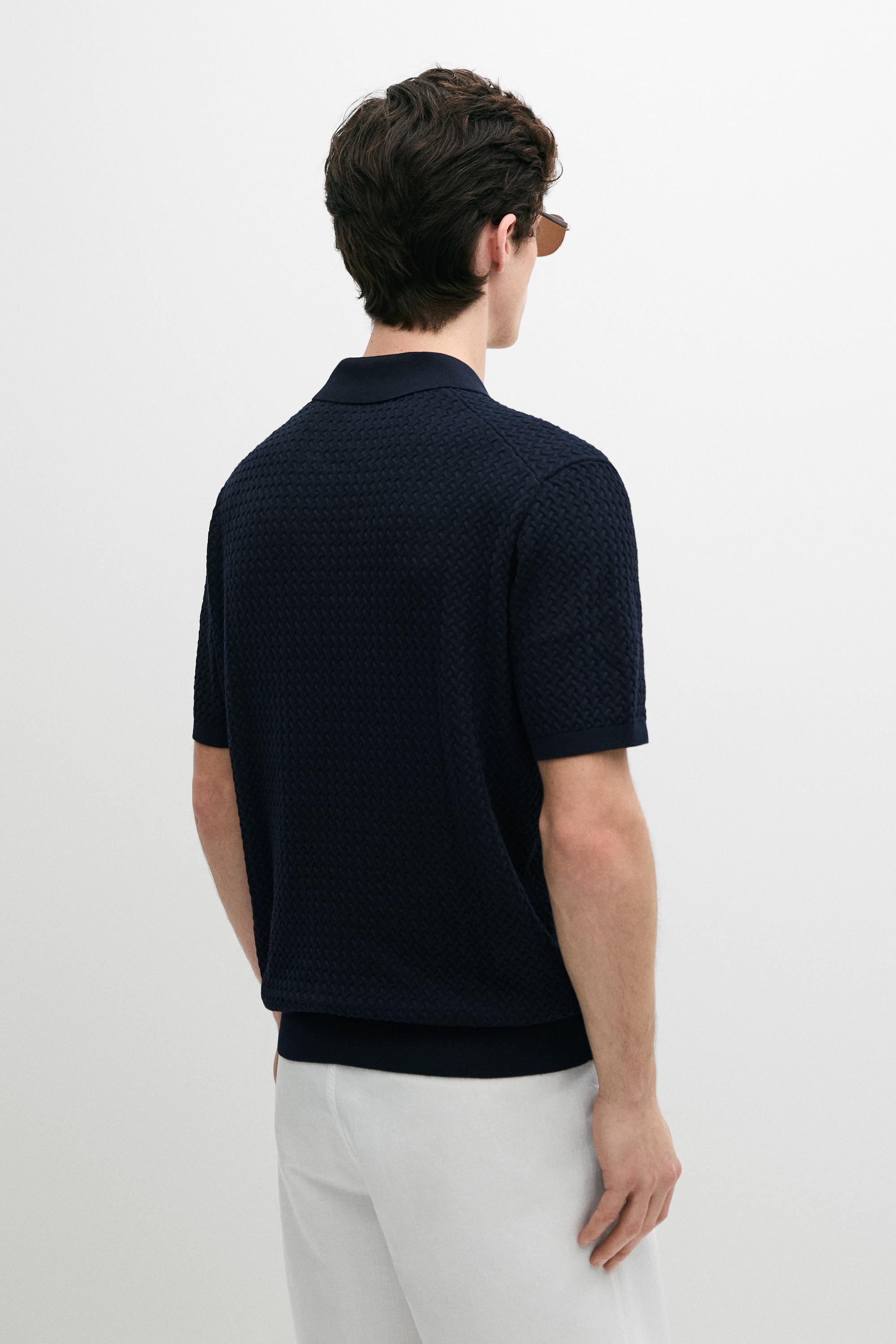 Polo en maille torsadée à col V