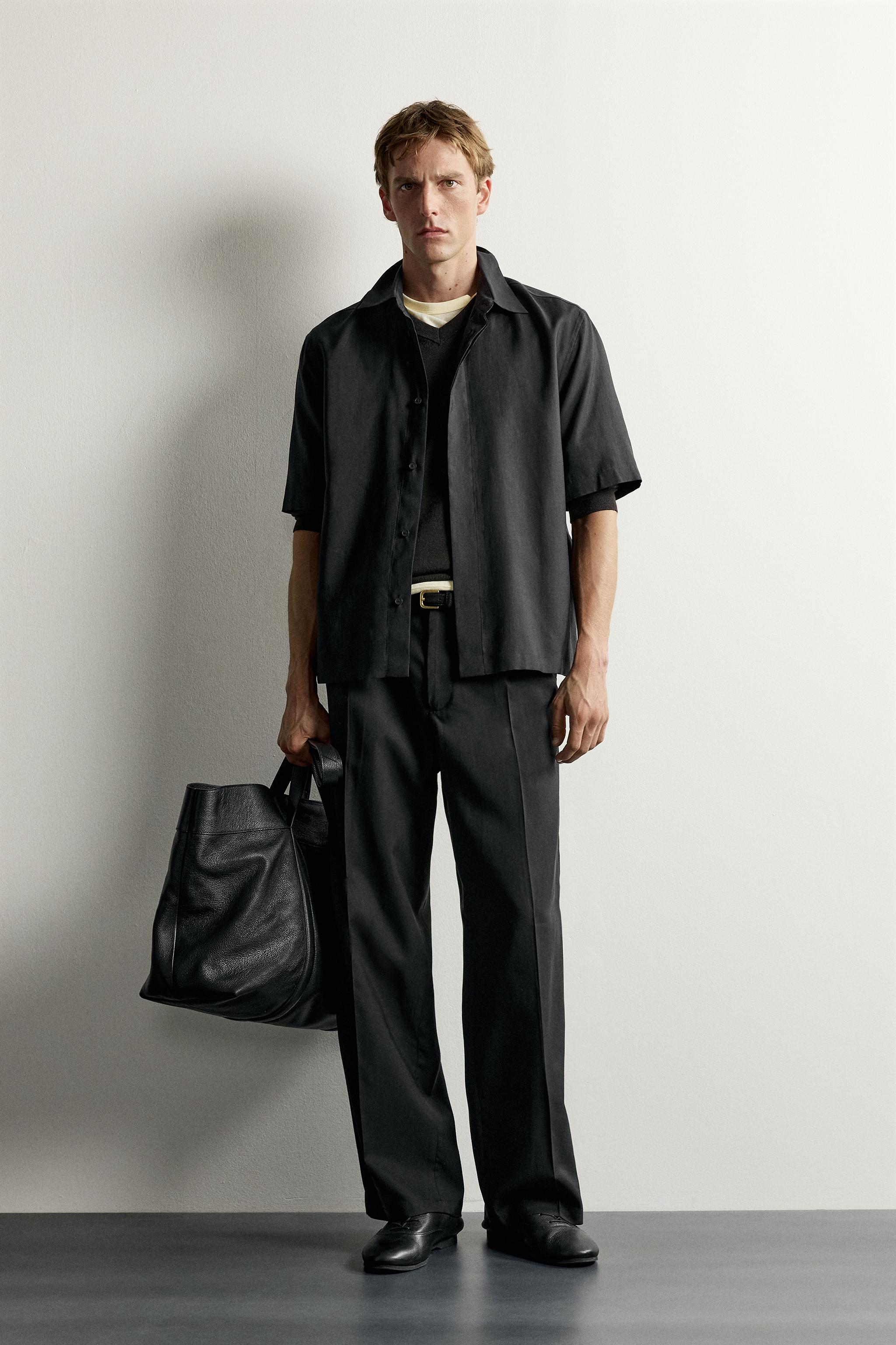 PLEATED FLOWY TROUSERS