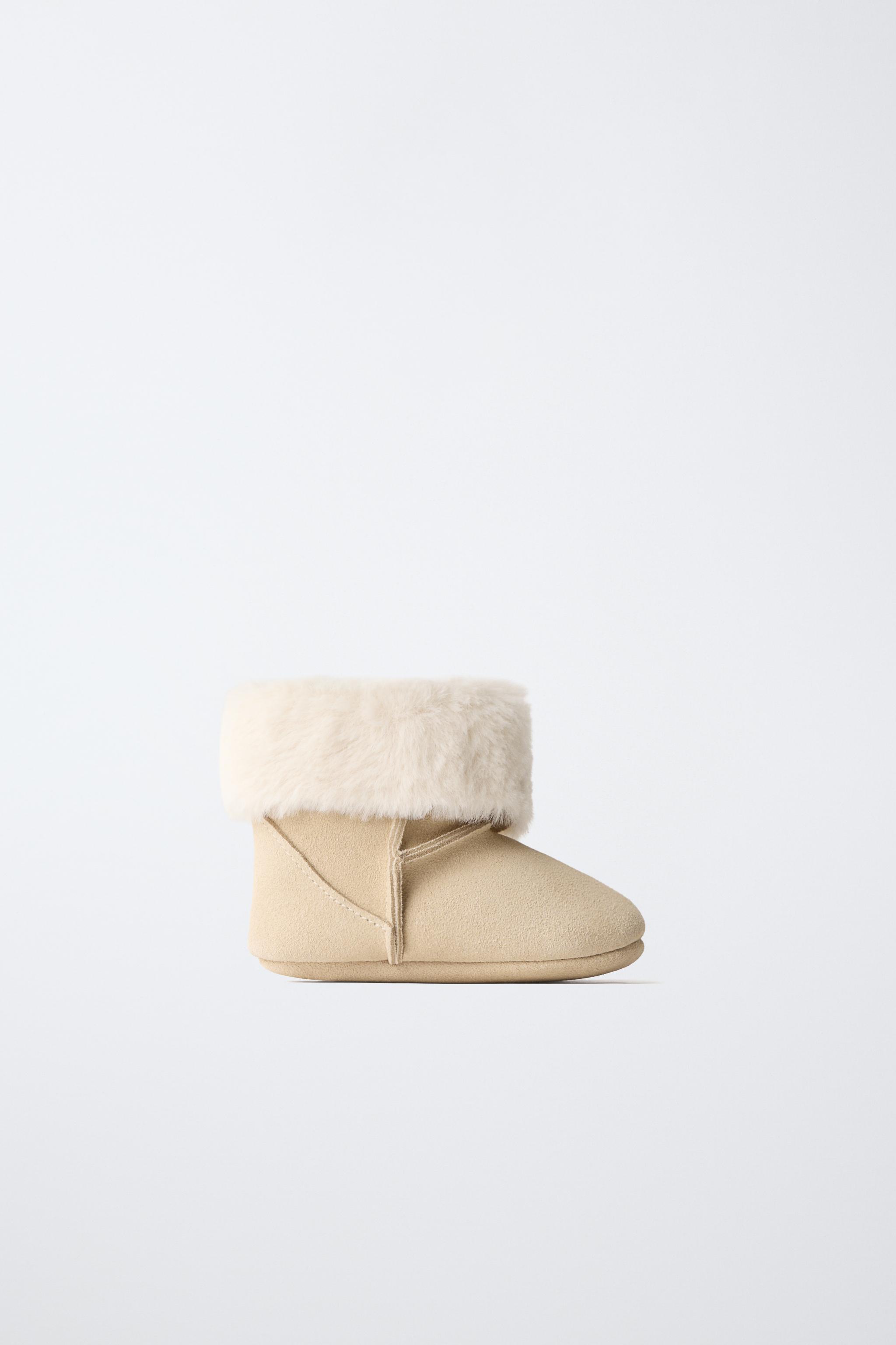 FUR-LINED LEATHER BOOTS