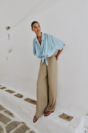 بنطلون منسدل عريض - بني/ توبو الخاص بـ Zara