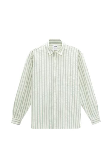 Front view of a green and white striped shirt with a front pocket and buttons.