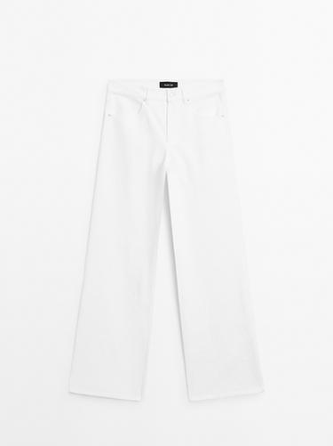 Pantalón tejanero detalle textura - Blanco roto de Zara