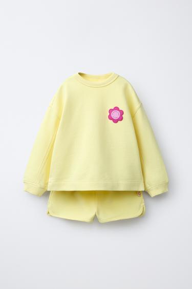 Zara SWEATSHIRT AND RUBBERIZED FLOWER BERMUDA SET - Black / Yellow - Image 0