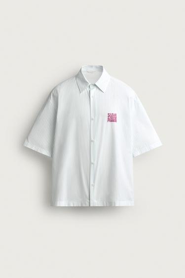 CAMISA BOXY FIT TEXTOS ESTAMPADOS - Blanco / Gris de Zara