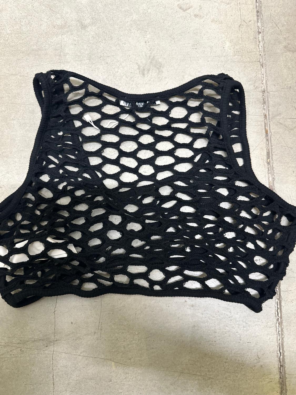 Black mesh top with large hole design on a light grey background.