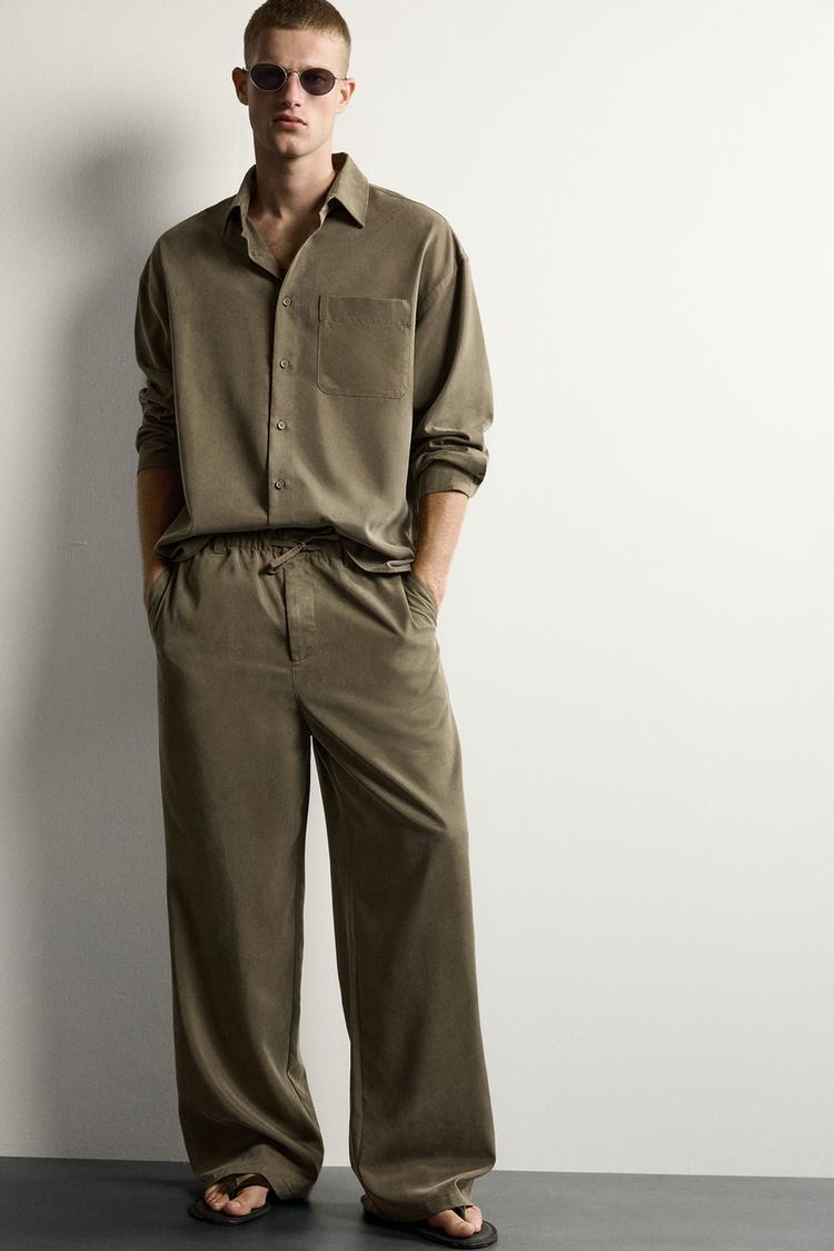 RELAXED FIT FLOWING TROUSERS