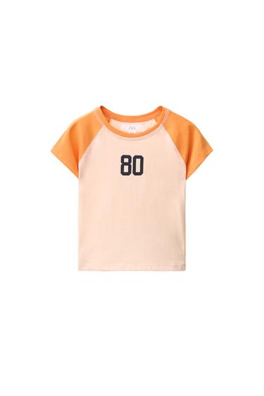 CAMISETA MANGA RANGLÁN - Naranja de Zara