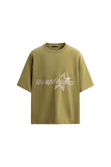 Front view of a teal sweatshirt with the text "Always Fearless" and star prints on the chest, crew neck, and short sleeves.