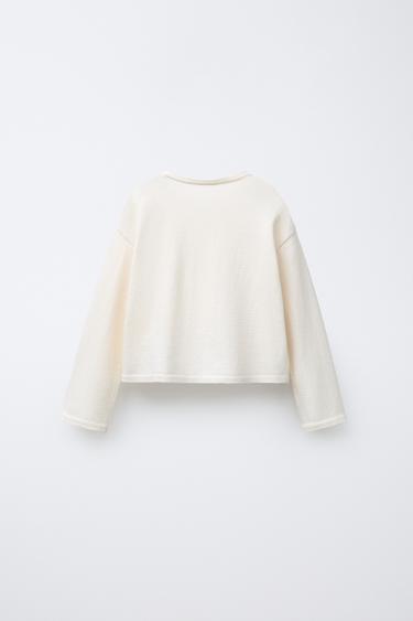 GILET EN MAILLE NŒUDS - Écru de Zara - Image 1