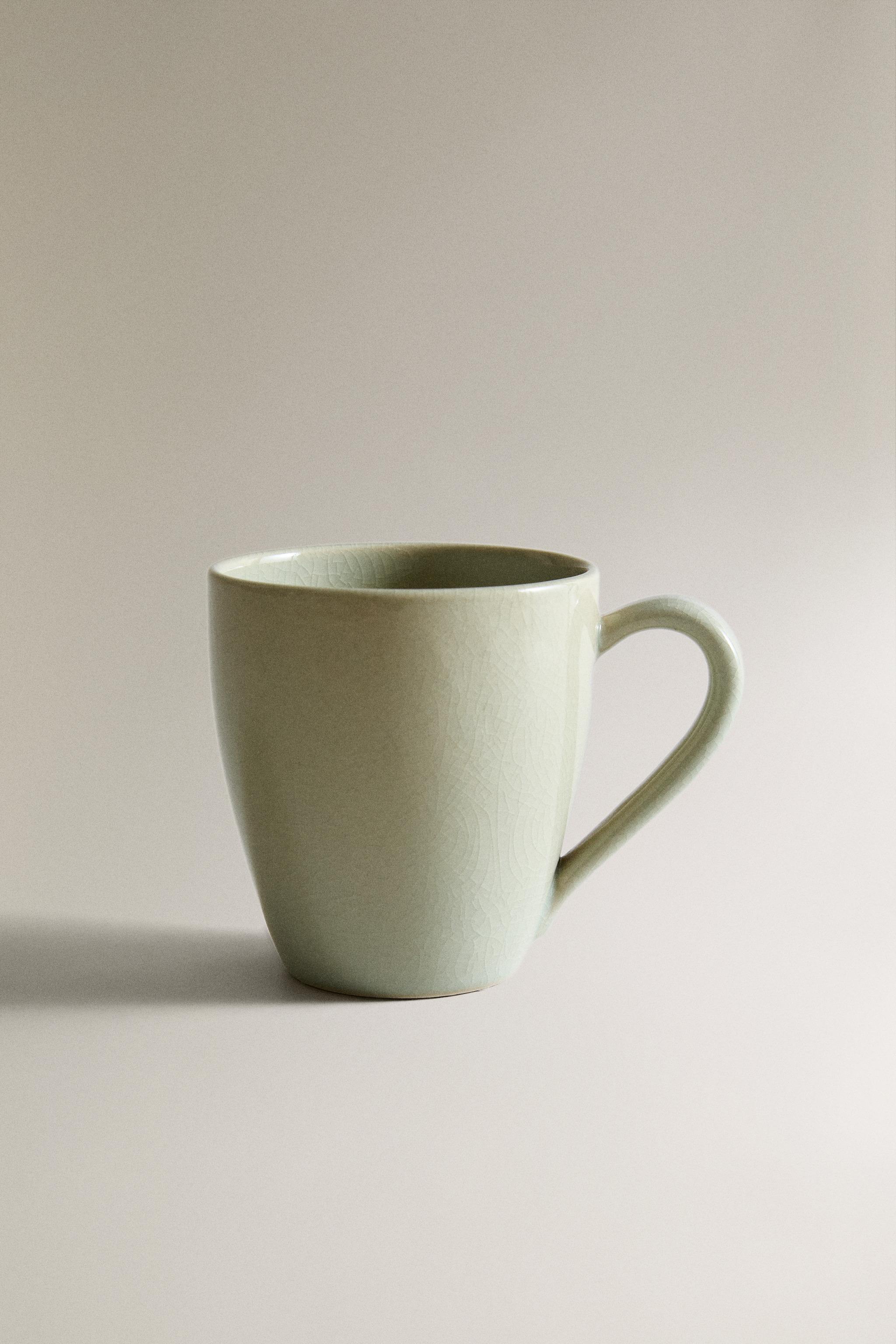ENAMELED STONEWARE MUG