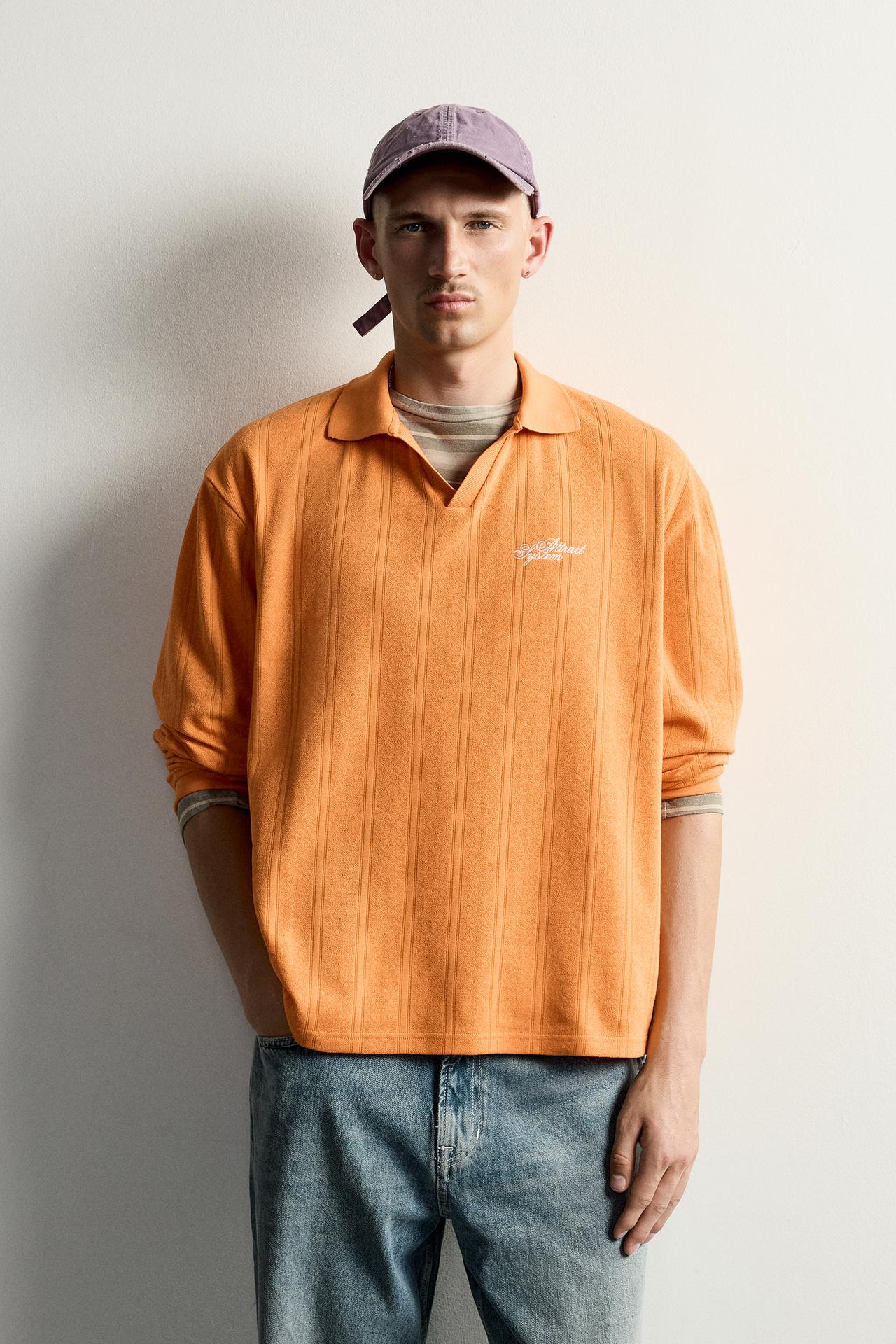 EMBROIDERED TEXT JACQUARD POLO — Burnt orange