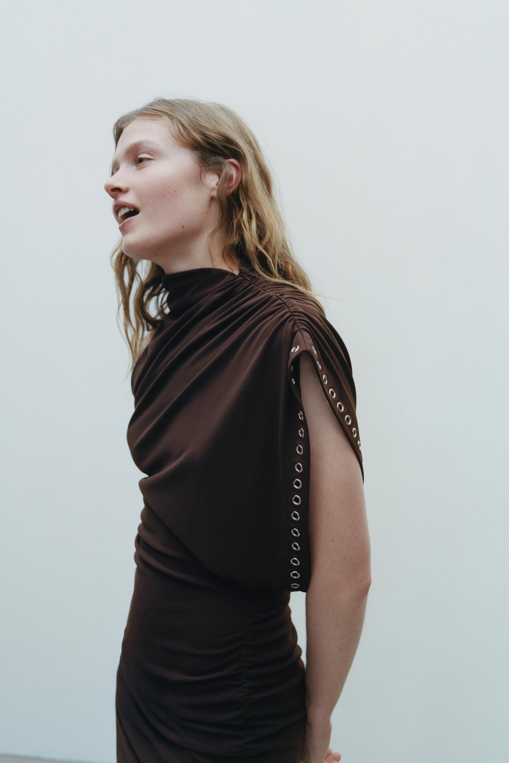 ASYMMETRIC CROTCHET DRESS WITH GROMMETS