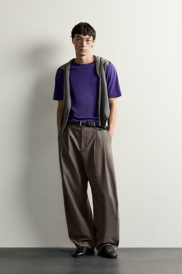 RELAXED FIT PLEATED TROUSERS