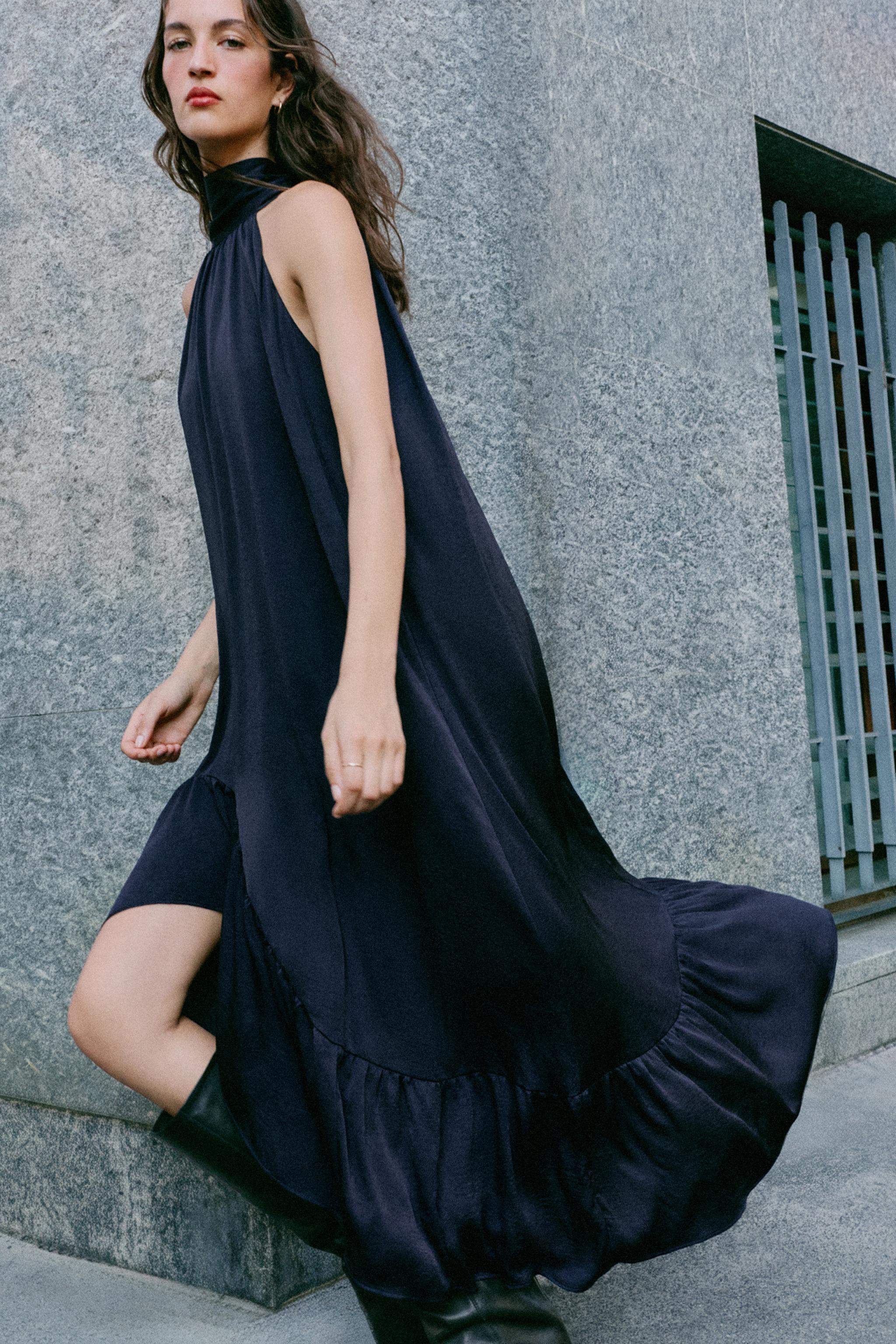ROBE MI-LONGUE HALTER VOLANT BAS