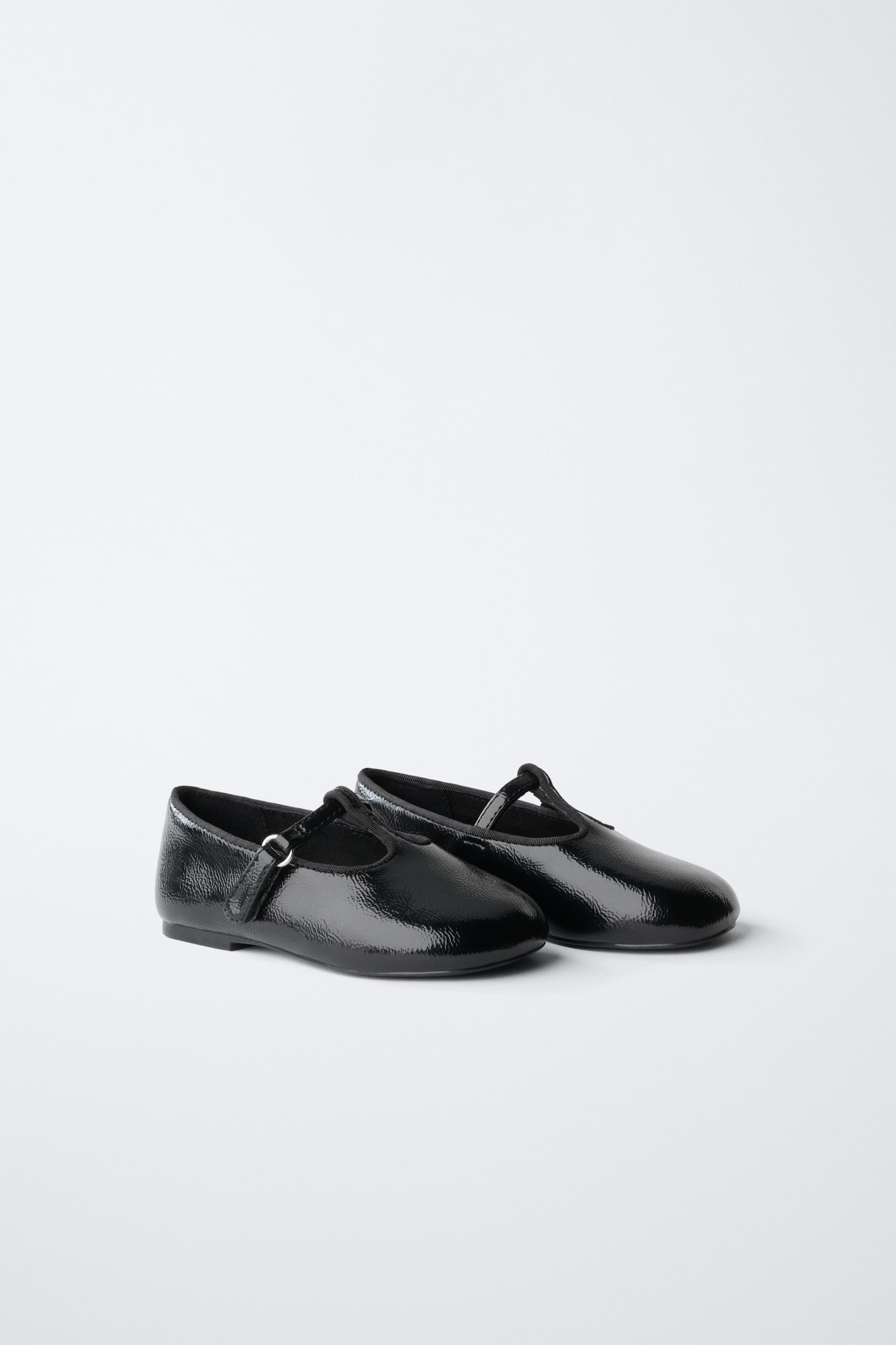 PATENT BUCKLE BALLET FLATS — Black